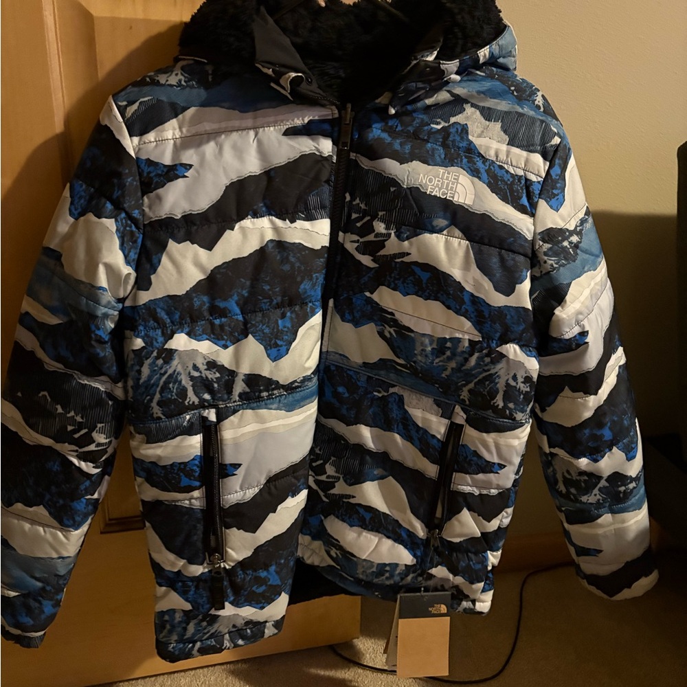 The North Face Kids Blue and Black Camo Puffer Jacket